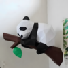 3D DIY paper cut panda perched on a tree