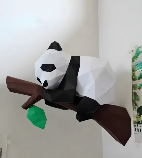 3D DIY paper cut panda perched on a tree